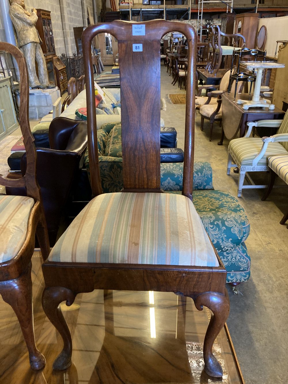 Two early 18th century walnut dining chairs